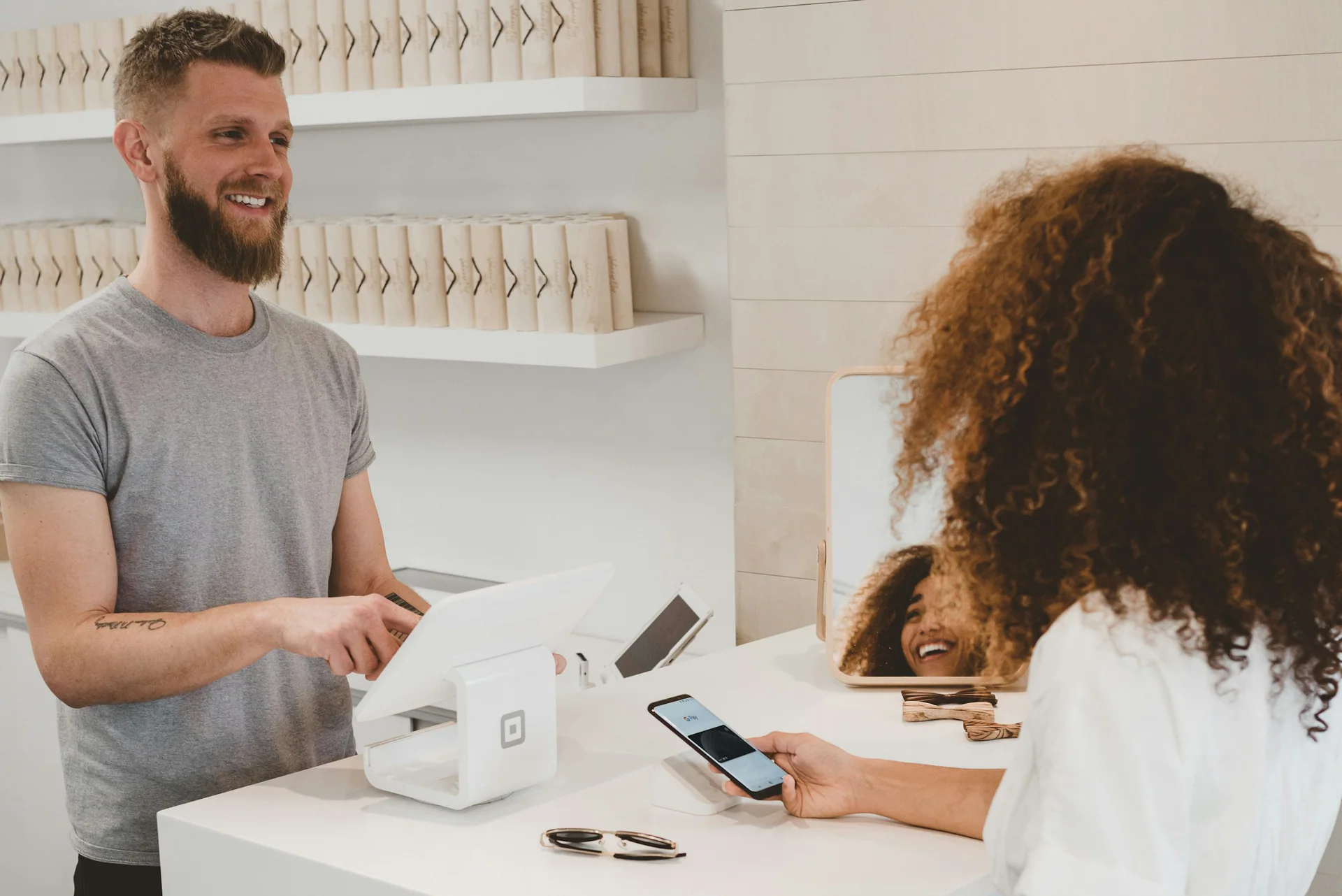 Retail customer checkout in a bright store